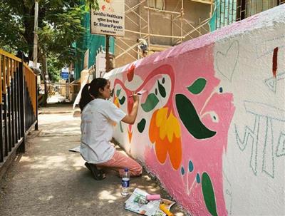 Big B's granddaughter paints wall to highlight menstrual hygiene