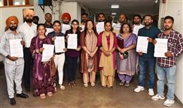 DR. BALJIT KAUR HANDS OVER APPOINTMENT LETTERS TO ELEVEN CLERKS, AT SOCIAL SECURITY DEPARTMENT